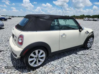 2015 MINI Convertible S с VIN WMWZP3C50F2A91635, выставлен на аукционе Copart как лот 61482285 с пробегом 105 437 миль миль и Списание • Salvage title. История ставок и продаж доступна на DreamBid. Изображение 3.