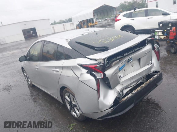 2017 Toyota Prius Two with VIN JTDKARFU4H3043433, listed as a IAAI auction lot 42310201 with 50,715 mi miles and . Bid and sale history available at DreamBid. Image 3.