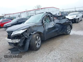2015 Acura MDX with VIN 5FRYD4H26FB025871, listed as a IAAI auction lot 42000001 with 112,297 mi miles and . Bid and sale history available at DreamBid. Image 2.