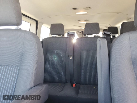 2018 Ford Transit Passenger XL z VIN 1FBZX2YG9JKA69909, wystawiony jako Copart lot #69885874 z przebiegiem 102 175 mil mil oraz Szkoda całkowita • Salvage title. Historia ofert i sprzedaży dostępna na DreamBid. Obrazek 10.