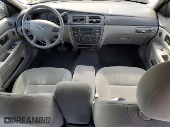 2003 Ford Taurus SE with VIN 1FAHP53233G244946, listed as a Copart auction lot 61238665 with 62,315 mi miles and Clean title. Bid and sale history available at DreamBid. Image 8.