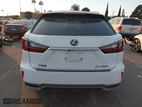 2019 Lexus RX with VIN 2T2BGMCAXKC036573, listed as a IAAI auction lot 41299079 with 104,568 mi miles. Bid and sale history available at carsss.com. Image 16.