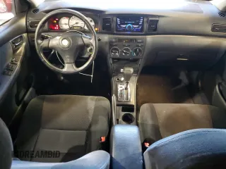 2003 Toyota Corolla CE with VIN 1NXBR32E63Z161048, listed as a Copart auction lot 83226694 with 299,999 mi miles and Salvage Title. Bid and sale history available at carsss.com. Image 8.
