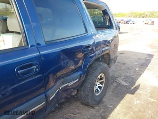 2002 Chevrolet Tahoe LT with VIN 1GNEK13Z42J140816, listed as a IAAI auction lot 41973686 with 241,722 mi miles. Bid and sale history available at carsss.com. Image 6.