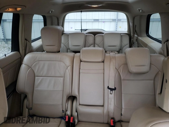 2013 Mercedes-Benz GL 450 z VIN 4JGDF7CE3DA122086, wystawiony jako Copart lot #52203515 z przebiegiem 105 680 mil mil oraz Szkoda całkowita • Salvage title. Historia ofert i sprzedaży dostępna na DreamBid. Obrazek 10.