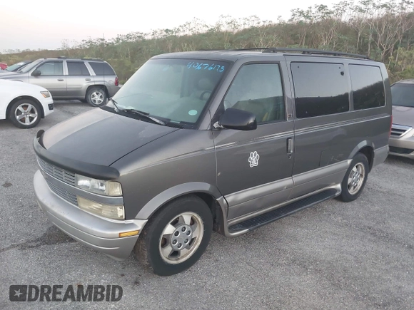 2003 Chevrolet Astro z VIN 1GNEL19X63B115821, wystawiony jako IAAI lot #41923632 z przebiegiem 107 341 mil mil oraz . Historia ofert i sprzedaży dostępna na DreamBid. Obrazek 2.