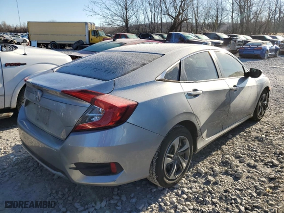 2019 Honda Civic Sedan LX with VIN 19XFC2F65KE022661, listed as a Copart auction lot 83552494 with 42,206 mi miles and Salvage Title. Bid and sale history available at carsss.com. Image 3.