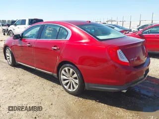 2013 Lincoln MKS with VIN 1LNHL9DK2DG612977, listed as a IAAI auction lot 41762687 with 149,420 mi miles. Bid and sale history available at carsss.com. Image 3.