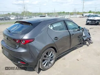 2023 Mazda 3 S Select with VIN JM1BPAKM3P1615785, listed as a IAAI auction lot 42064302 with 63,928 mi miles and . Bid and sale history available at DreamBid. Image 4.