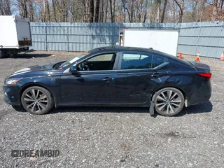 2021 Nissan Altima SR with VIN 1N4BL4CV6MN369815, listed as a IAAI auction lot 41878884 with 60,629 mi miles and . Bid and sale history available at carsss.com. Image 14.