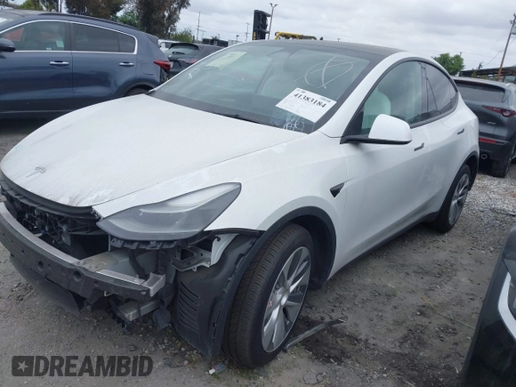2023 Tesla Model Y Long Range z VIN 7SAYGDEE9PF623285, wystawiony jako IAAI lot #41383184 z przebiegiem 34 092 mil mil oraz . Historia ofert i sprzedaży dostępna na DreamBid. Obrazek 19.