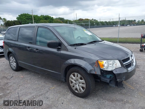 2019 Dodge Grand Caravan SE with VIN 2C4RDGBGXKR796974, listed as a IAAI auction lot 42008704 with 129,229 mi miles and . Bid and sale history available at DreamBid. Image 1.