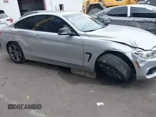 2015 BMW 4 Series 428i z VIN WBA3N7C50FK222398, wystawiony jako IAAI lot #42211723 z przebiegiem 149 853 mil mil oraz . Historia ofert i sprzedaży dostępna na DreamBid. Obrazek 6.