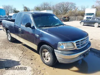1999 Ford F-150 with VIN 1FTZX1724XKA57395, listed as a IAAI auction lot 41584584 with 171,342 mi miles and . Bid and sale history available at DreamBid. Image 1.
