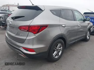 2018 Hyundai Santa Fe 2.4L with VIN 5XYZT3LB7JG569517, listed as a IAAI auction lot 42141100 with 57,854 mi miles and . Bid and sale history available at DreamBid. Image 4.