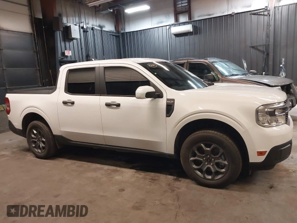 2022 Ford Maverick XL z VIN 3FTTW8E32NRA79563, wystawiony jako IAAI lot #41412289 z przebiegiem 43 839 mil mil oraz . Historia ofert i sprzedaży dostępna na DreamBid. Obrazek 13.