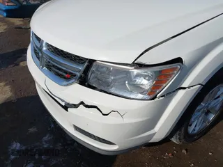 2014 Dodge Journey SE with VIN 3C4PDCAB0ET293641, listed as a IAAI auction lot 42001844 with 138,740 mi miles. Bid and sale history available at carsss.com. Image 6.