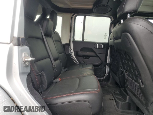 2023 Jeep Wrangler Rubicon with VIN 1C4JJXFM4PW589923, listed as a Copart auction lot 58725465 with 9,814 mi miles and Salvage title. Bid and sale history available at DreamBid. Image 11.