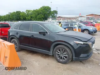 2021 Mazda CX-9 Sport with VIN JM3TCABY6M0522352, listed as a IAAI auction lot 42613136 with 106,167 mi miles and . Bid and sale history available at DreamBid. Image 13.