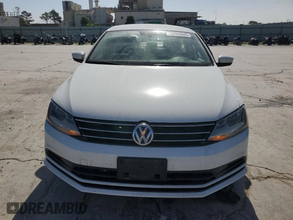 2017 Volkswagen Jetta S with VIN 3VW2B7AJ2HM322695, listed as a Copart auction lot 56958605 with 126,360 mi miles and Salvage title. Bid and sale history available at DreamBid. Image 5.