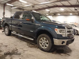 2014 Ford F-150 XL with VIN 1FTFW1ET1EKD06590, listed as a IAAI auction lot 41217519 with 155,792 mi miles and . Bid and sale history available at carsss.com. Image 1.