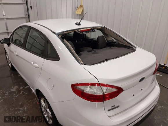 2017 Ford Fiesta SE with VIN 3FADP4BJ5HM156141, listed as a IAAI auction lot 42085359 with 52,015 mi miles and . Bid and sale history available at DreamBid. Image 6.