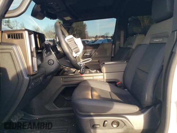 2025 GMC Hummer EV 2X with VIN 1GKB0NDE5SU102096, listed as a Copart auction lot 47083615 with 8,713 mi miles and Salvage Title. Bid and sale history available at carsss.com. Image 7.
