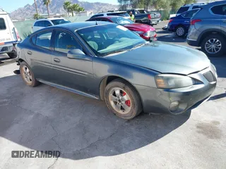2005 Pontiac Grand Prix z VIN 2G2WP522151246119, wystawiony jako IAAI lot #41866571 z przebiegiem 157 868 mil mil oraz . Historia ofert i sprzedaży dostępna na DreamBid. Obrazek 1.