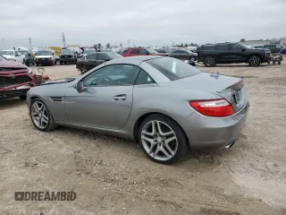 2014 Mercedes-Benz SLK 250 with VIN WDDPK4HA0EF091357, listed as a Copart auction lot 46293775 with 71,994 mi miles and Salvage title. Bid and sale history available at DreamBid. Image 2.