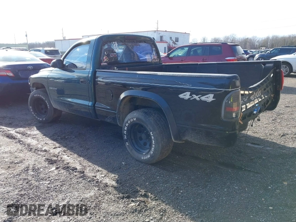 1999 Dodge Dakota SLT with VIN 1B7FL26X0XS208461, listed as a IAAI auction lot 41492338 with 185,400 mi miles. Bid and sale history available at carsss.com. Image 3.