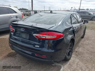 2020 Ford Fusion SE with VIN 3FA6P0HD3LR222152, listed as a IAAI auction lot 41615997 with 107,119 mi miles. Bid and sale history available at carsss.com. Image 4.