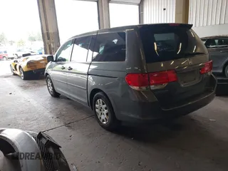 2008 Honda Odyssey LX with VIN 5FNRL38258B064490, listed as a IAAI auction lot 42228533 with 126,043 mi miles and . Bid and sale history available at DreamBid. Image 3.