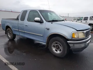1998 Ford F-150 z VIN 1FTZX1762WKB76211, wystawiony jako IAAI lot #41518425 z przebiegiem 265 987 mil mil oraz . Historia ofert i sprzedaży dostępna na DreamBid. Obrazek 1.
