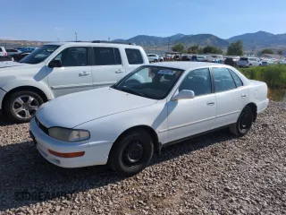 1994 Toyota Camry LE z VIN JT2SK12EXR0215277, wystawiony jako Copart lot #59789275 z przebiegiem 194 596 mil mil oraz Szkoda całkowita • Salvage title. Historia ofert i sprzedaży dostępna na DreamBid. Obrazek 1.