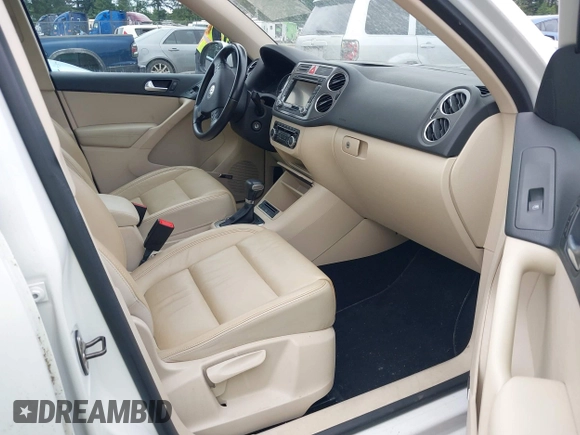 2010 Volkswagen Tiguan with VIN WVGBV9AX2AW513478, listed as a IAAI auction lot 42607466 with 63,780 mi miles and . Bid and sale history available at DreamBid. Image 5.