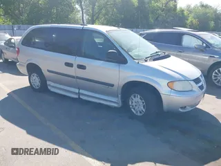 2007 Dodge Grand Caravan SE with VIN 1D4GP24R77B185034, listed as a IAAI auction lot 42503537 with 153,150 mi miles and . Bid and sale history available at DreamBid. Image 1.
