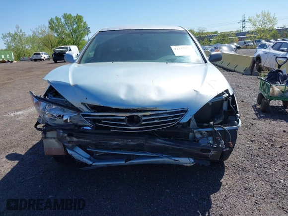 2005 Toyota Camry STD z VIN 4T1BE32K65U994854, wystawiony jako IAAI lot #42137074 z przebiegiem 104 051 mil mil oraz . Historia ofert i sprzedaży dostępna na DreamBid. Obrazek 12.