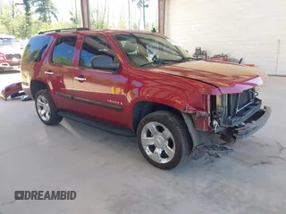 2007 Chevrolet Tahoe LS with VIN 1GNFC13C07R256584, listed as a IAAI auction lot 42678748 with 214,040 mi miles and . Bid and sale history available at DreamBid. Image 1.