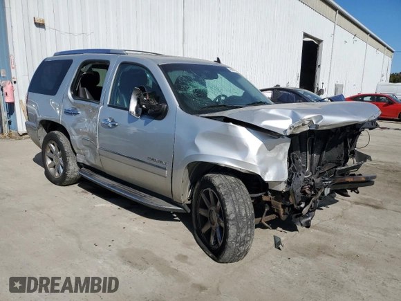 2011 GMC Yukon Denali with VIN 1GKS2EEF5BR338669, listed as a Copart auction lot 76604324 with 156,641 mi miles and Salvage Title. Bid and sale history available at DreamBid. Image 4.