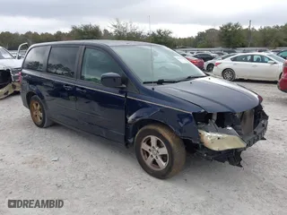 2012 Dodge Grand Caravan SE with VIN 2C4RDGBG3CR328103, listed as a IAAI auction lot 41463648 with 115,186 mi miles. Bid and sale history available at carsss.com. Image 1.