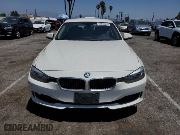 2015 BMW 3 Series 328i with VIN WBA3C1C56FK122177, listed as a Copart auction lot 57333625 with 102,399 mi miles and Salvage title. Bid and sale history available at DreamBid. Image 5.