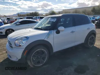 2016 MINI Countryman with VIN WMWZB3C51GWM33437, listed as a Copart auction lot 48151755 with 104,381 mi miles and Salvage title. Bid and sale history available at DreamBid. Image 1.