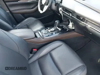 2023 Mazda CX-30 S Premium with VIN 3MVDMBDM7PM528297, listed as a IAAI auction lot 41637542 with 48,935 mi miles and . Bid and sale history available at DreamBid. Image 5.