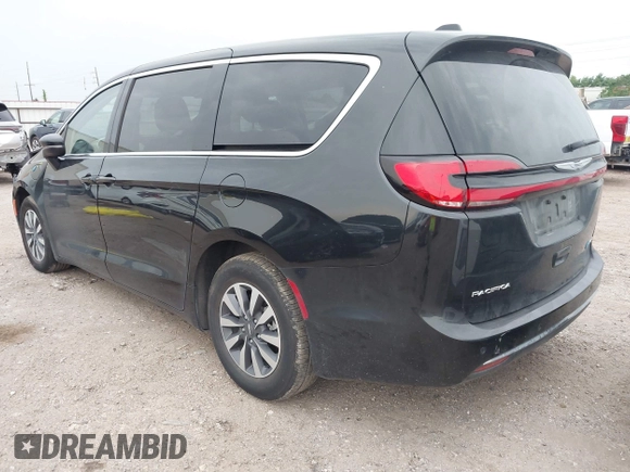 2023 Chrysler Pacifica Hybrid Touring L z VIN 2C4RC1L77PR631132, wystawiony jako IAAI lot #42391834 z przebiegiem 61 868 mil mil oraz . Historia ofert i sprzedaży dostępna na DreamBid. Obrazek 3.