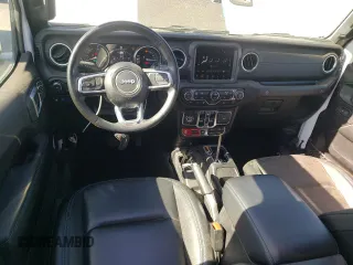 2023 Jeep Wrangler Rubicon 20th Anniversary with VIN 1C4JJXR63PW538877, listed as a Copart auction lot 57635015 with 25,924 mi miles and Salvage title. Bid and sale history available at DreamBid. Image 8.