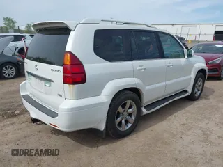 2004 Lexus GX 470 with VIN JTJBT20X440062559, listed as a IAAI auction lot 42142442 with 261,126 mi miles. Bid and sale history available at carsss.com. Image 4.