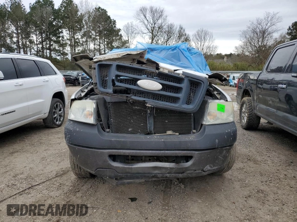 2006 Ford F-150 XL with VIN 1FTPX12V36KD14067, listed as a Copart auction lot 87947545 with 216,700 mi miles and Salvage Title. Bid and sale history available at carsss.com. Image 5.