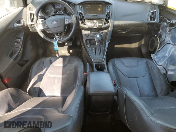 2017 Ford Focus Titanium with VIN 1FADP3J21HL260065, listed as a Copart auction lot 53165945 with 110,540 mi miles and Salvage title. Bid and sale history available at DreamBid. Image 8.