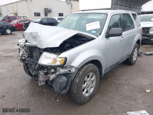 2011 Mazda Tribute Sport with VIN 4F2CY9C7XBKM01050, listed as a IAAI auction lot 41433870 with 122,287 mi miles. Bid and sale history available at carsss.com. Image 17.
