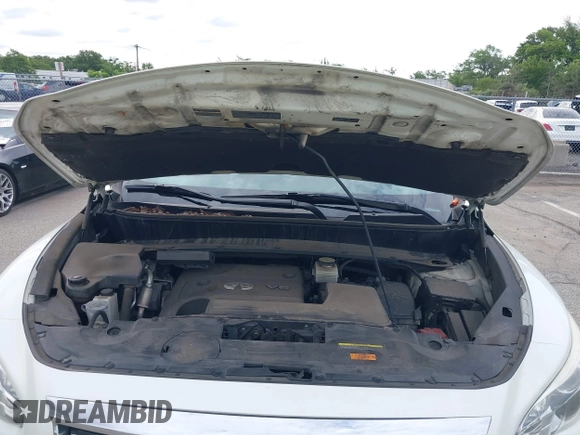 2015 Infiniti QX60 with VIN 5N1AL0MM3FC540132, listed as a IAAI auction lot 42760442 with 197,075 mi miles and . Bid and sale history available at DreamBid. Image 10.